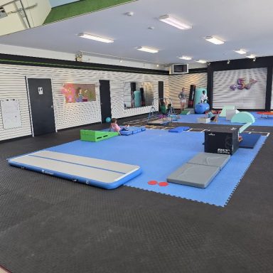RAZ Gymnastics Training Area in Rockland Ontario RAZ Gymnastics training area with air track, trampoline and blue mats